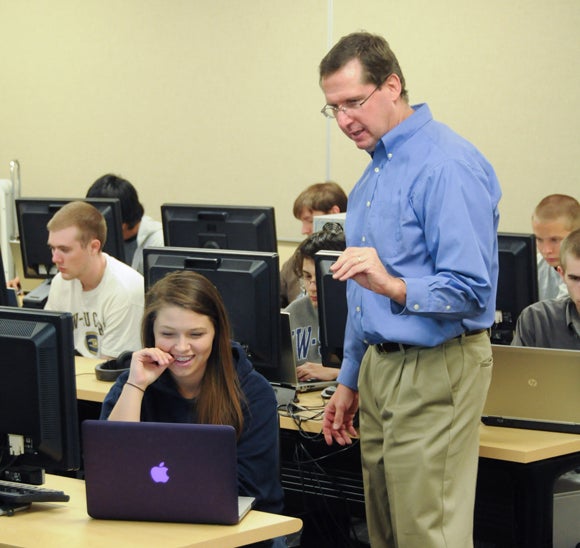 Professor Terry Mason works with an applied mathematics and computer science student at UW-Stout