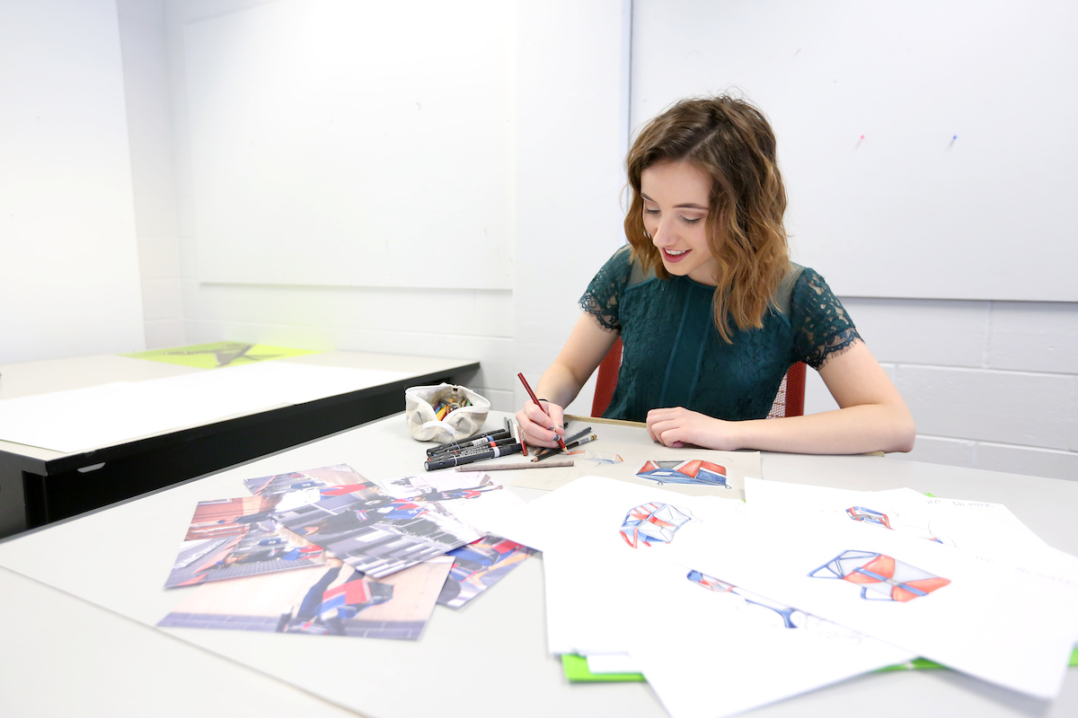 Julia Hurley, a senior Industrial Design student, works on design concept drawings in the Applied Arts Building Tuesday, December 19, 2017. (UW-Stout photo by Brett T. Roseman)