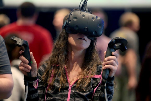 A visitor to the Stout Game Expo held in May tries a virtual reality video game.