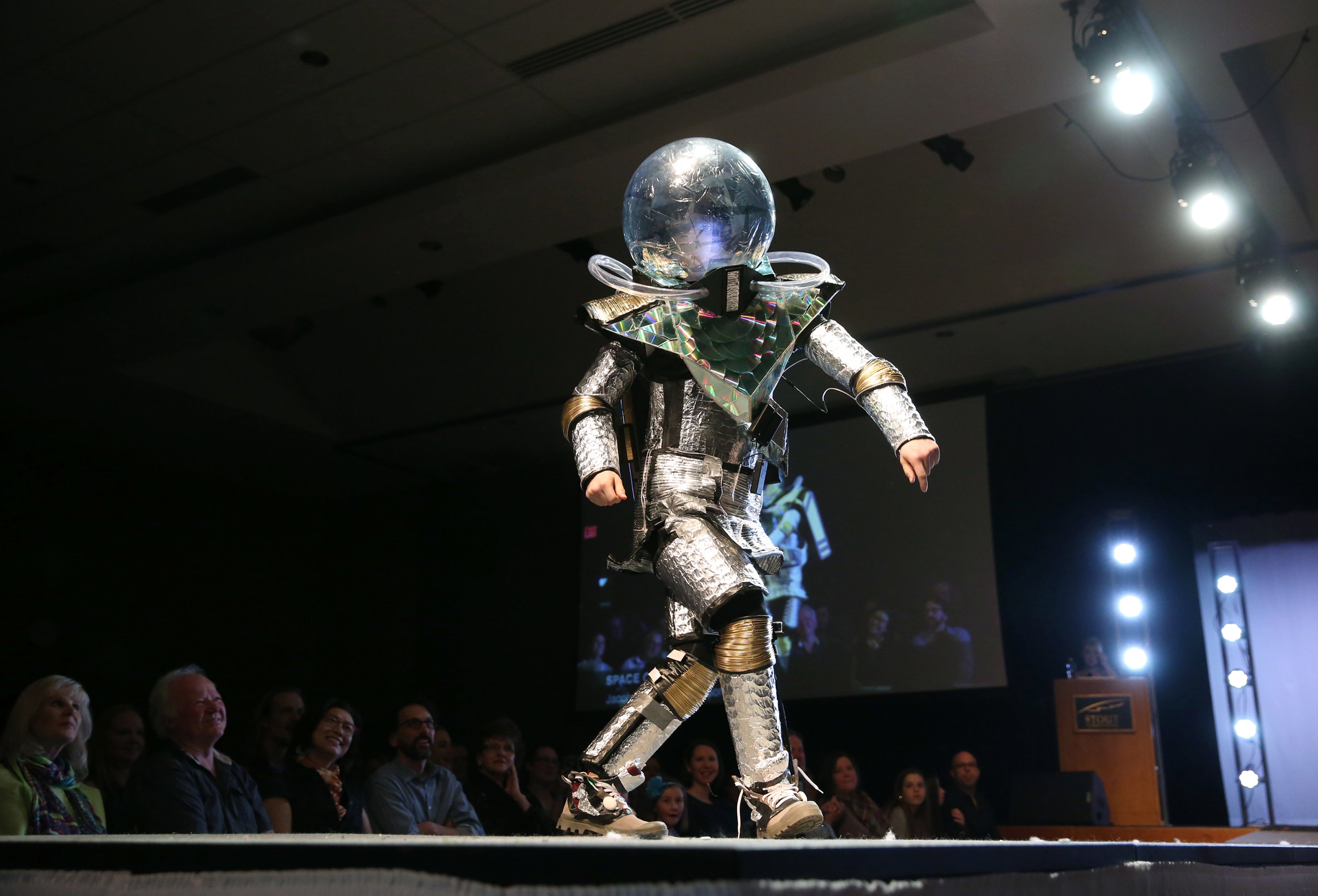 "Space Odyssey" created by students Jacob Harter and Jack Olson, is modeled by Jude Pelowski at the 2017 Fashion Without Fabric show.