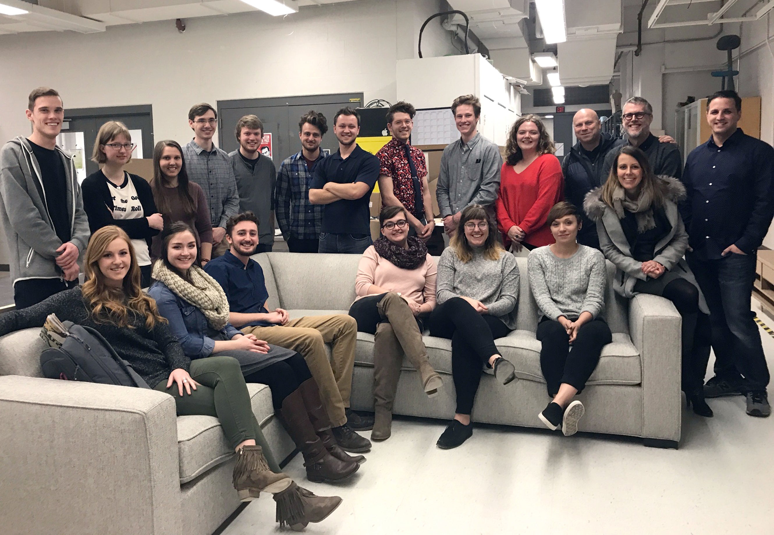 Industrial design students visit Room & Board, which donated the sofa and $2,000 to the program.