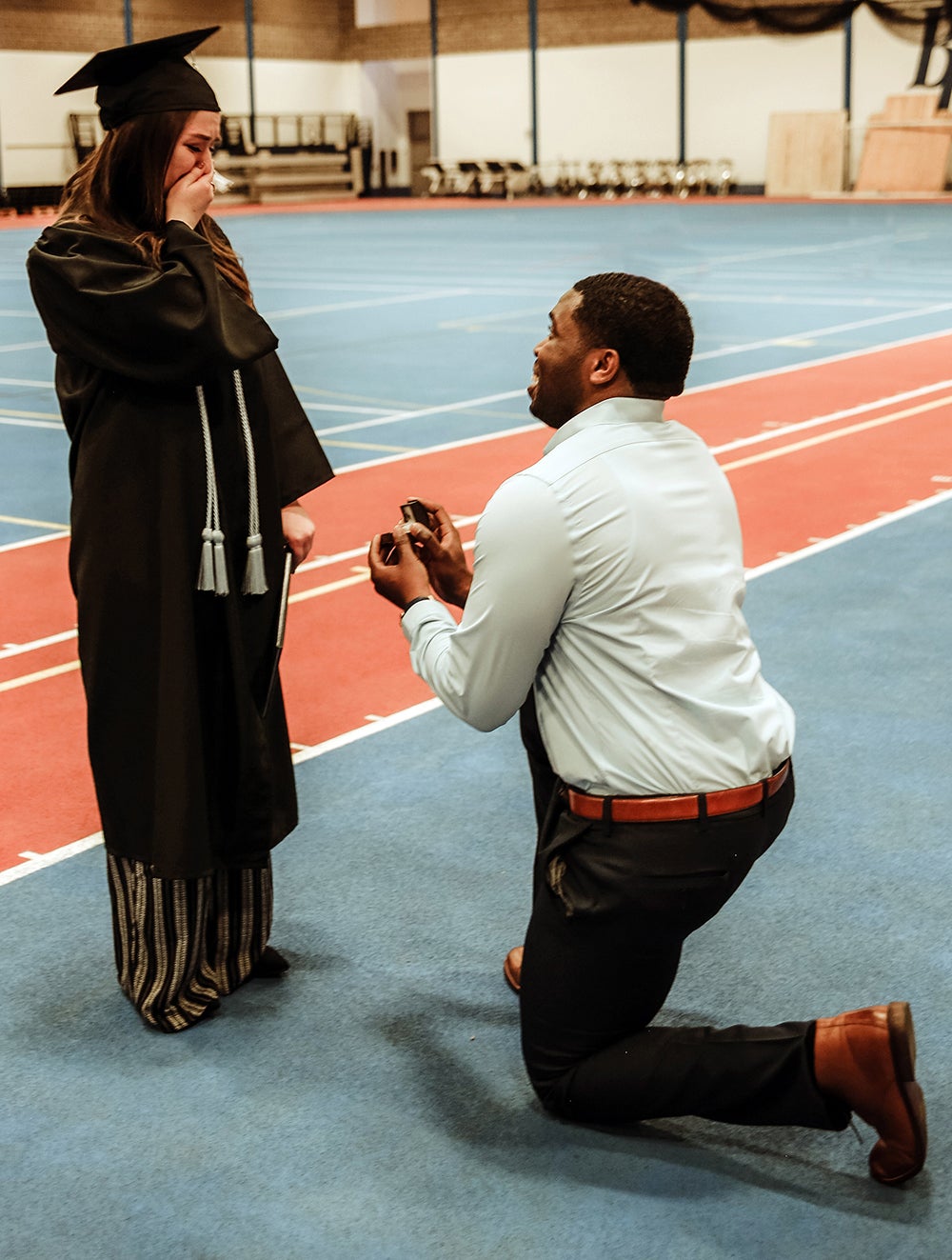 Taryn Zacher got a surprise after UW-Stout’s graduation May 5 when her boyfriend, Kerron Henry, proposed./ Photo by Miranda Wipperfurth, MLW Photography