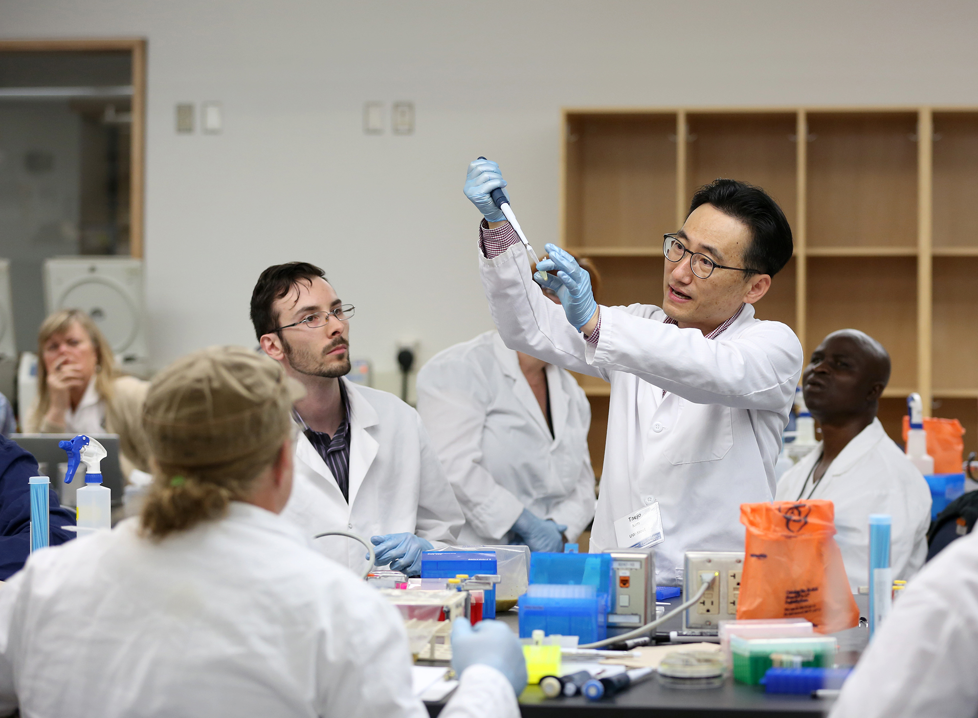 Taejo Kim, University of Wisconsin-Stout assistant professor in the department of food and nutrition, describes food safety and testing for foodborne pathogens at a UW-Stout Furthering Food Safety Workshop. /UW-Stout photos by Brett T. Roseman.