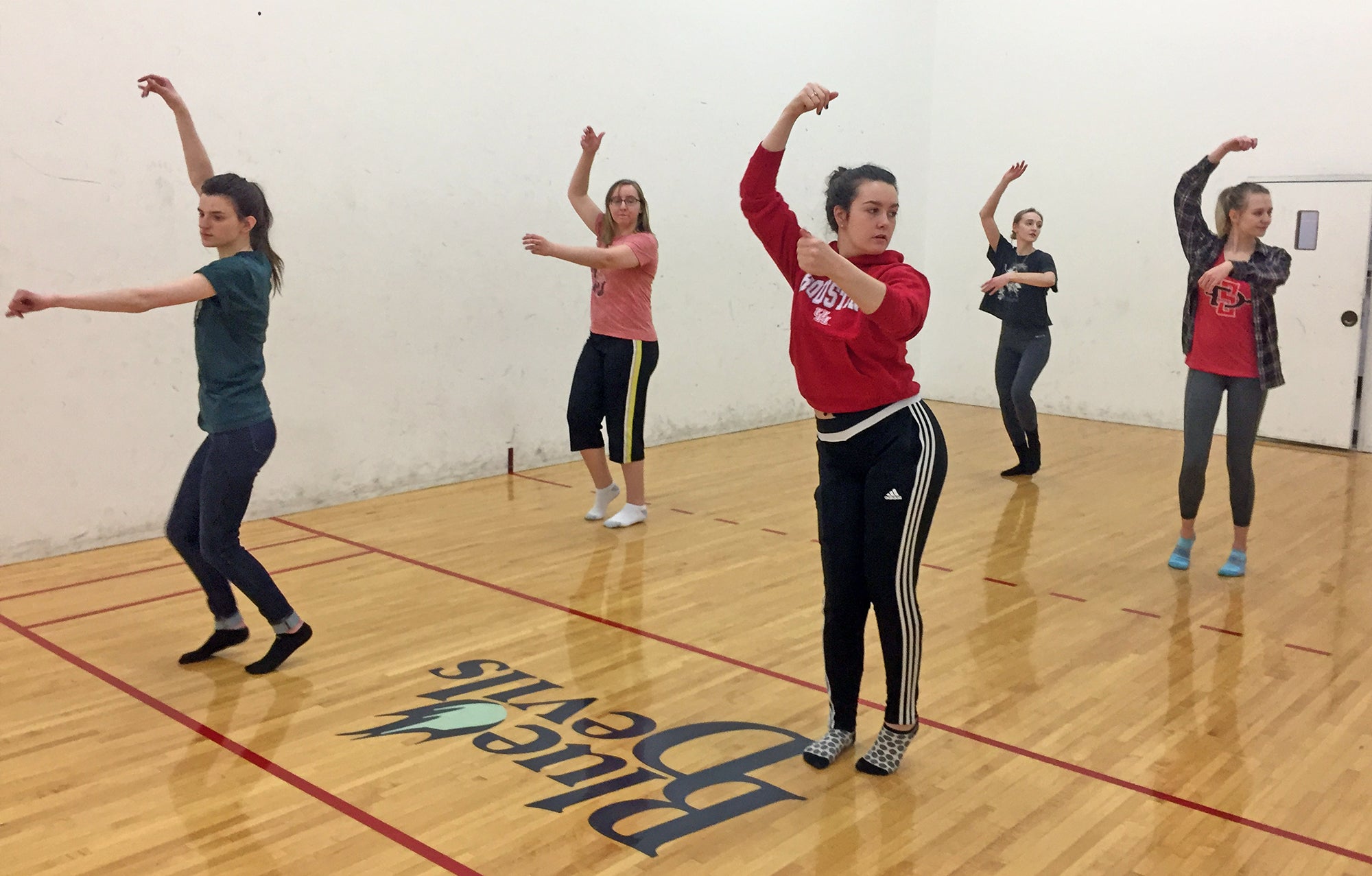 Members of the UW-Stout Dance Ensemble practice. They will present Evolution of Dance at the Johnson Fieldhouse gymnasium on Friday, April 26, and Saturday, April 27.