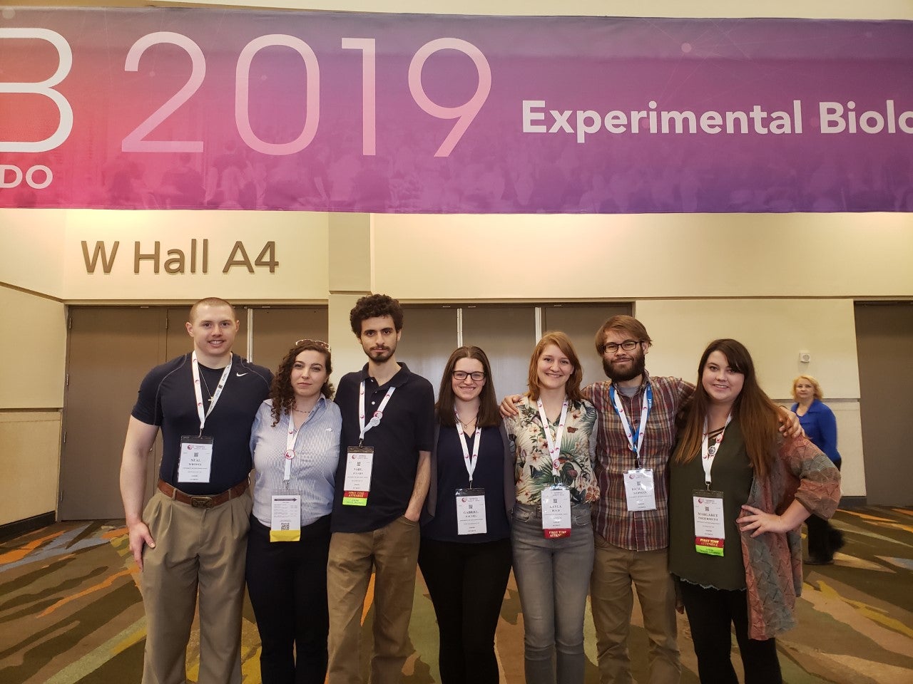 UW-Stout ASBMB members posing under the Experimental Biology 2019 banner.