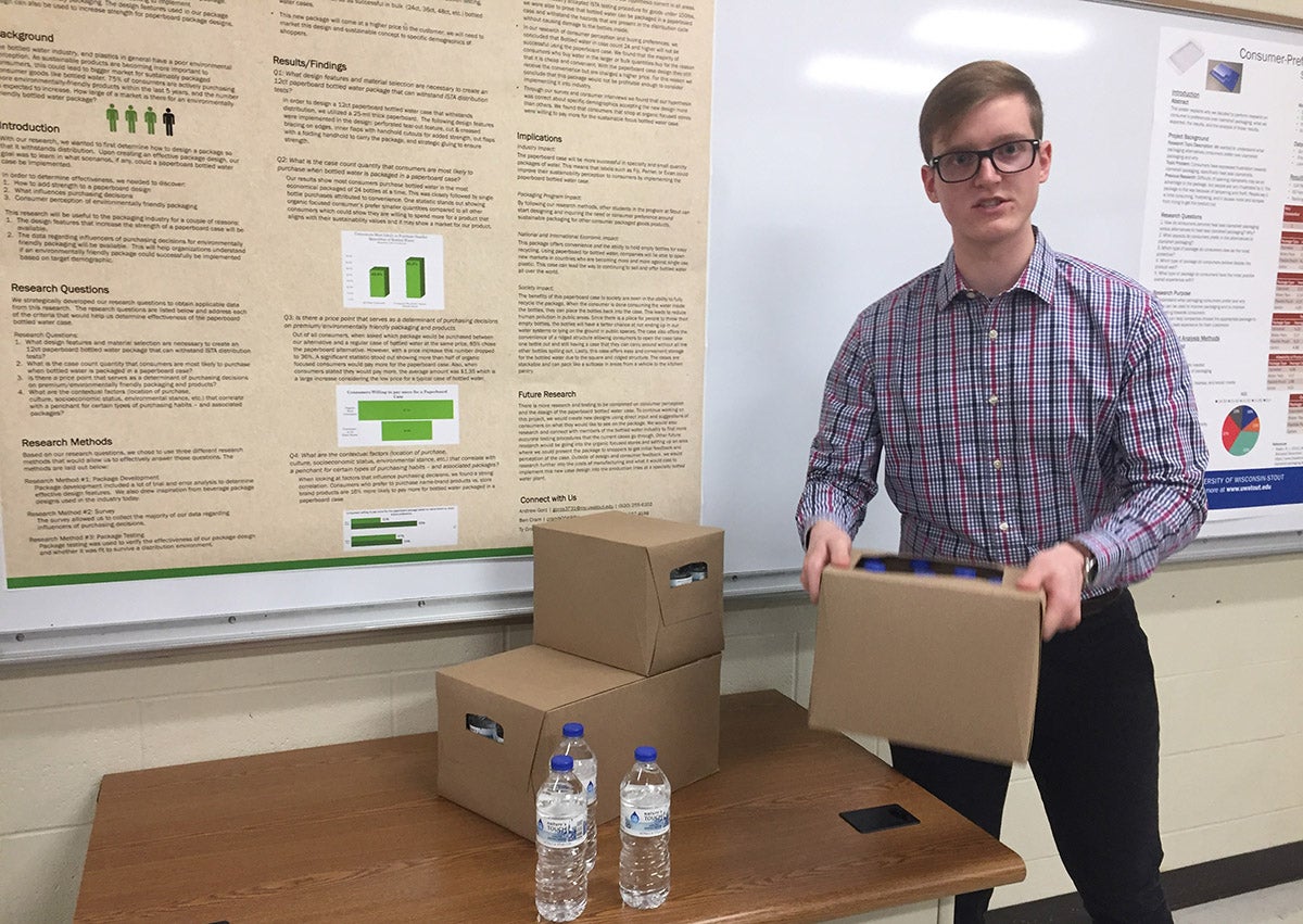 UW-Stout packaging student Ben Cram talks about a paperboard case for bottled water that appeals to upscale customers for its sustainability over plastic shrink wrap.