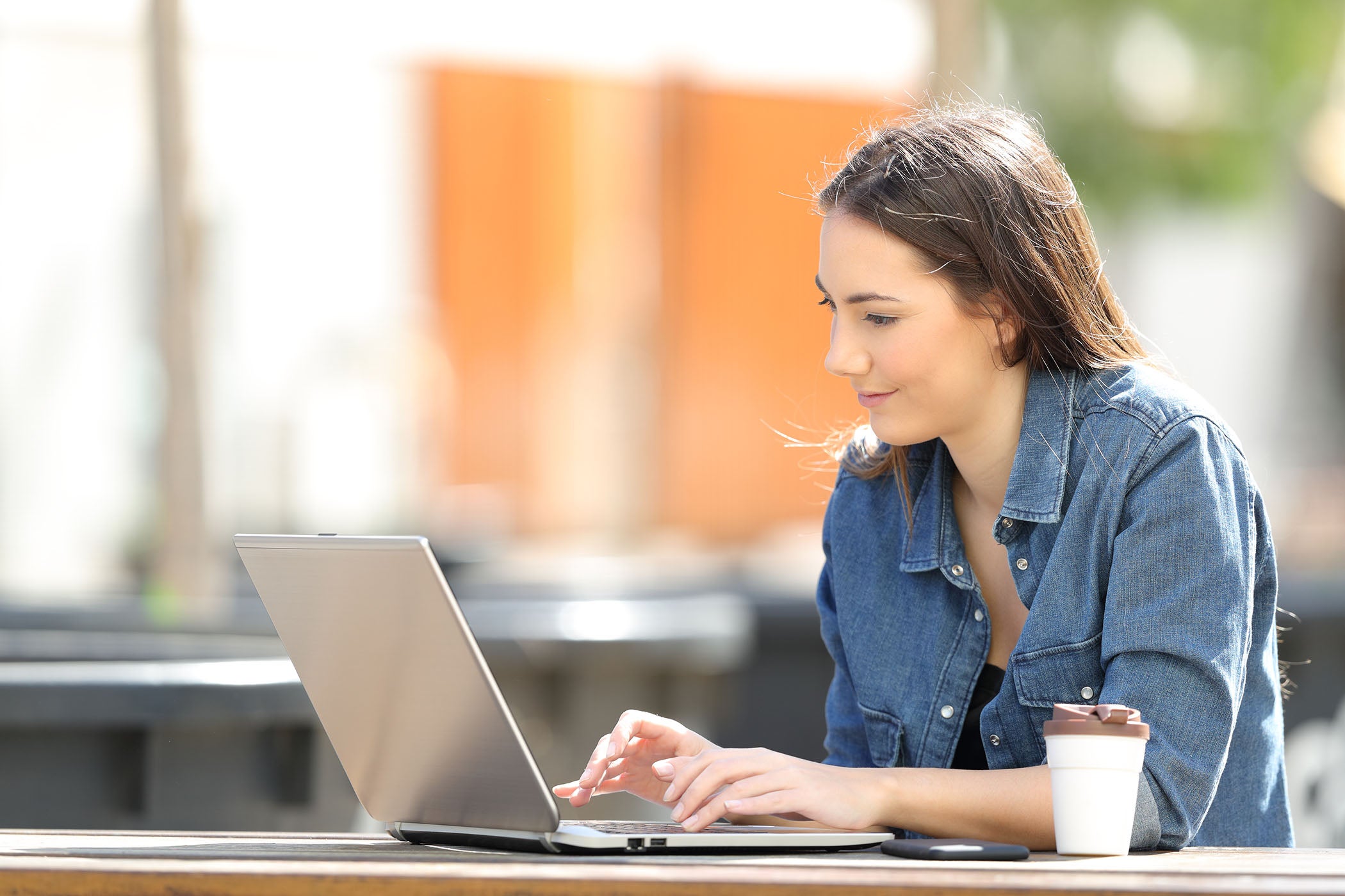 She is writing an email