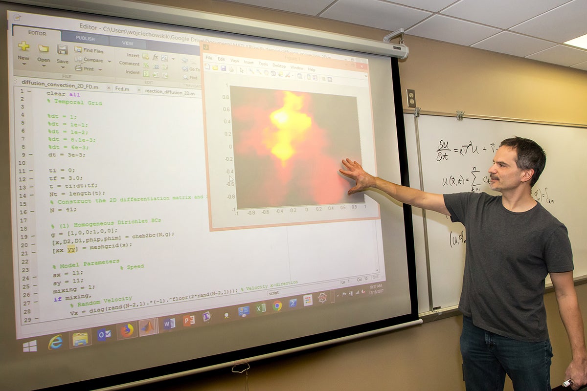 Keith Wojciechowski, mathematics, statistics and computer science, who was recently promoted to a full professor at UW-Stout, teaches a class in 2017. A total of 28 faculty received promotions or tenure from the Board of Regents.