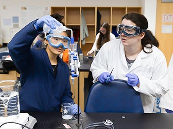 Students collaborate on hands-on experiment in Chemistry Lab.