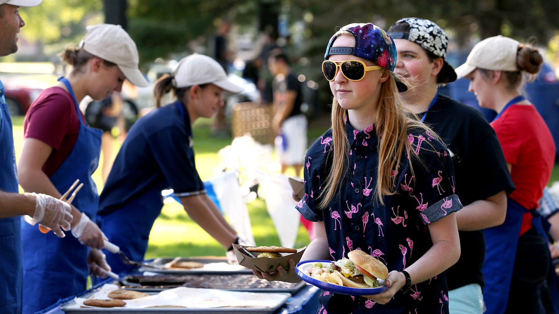 Students getting food at the Great Stout Cookout