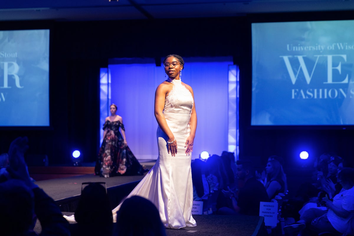 A model on the fashion runway in a bridal gown