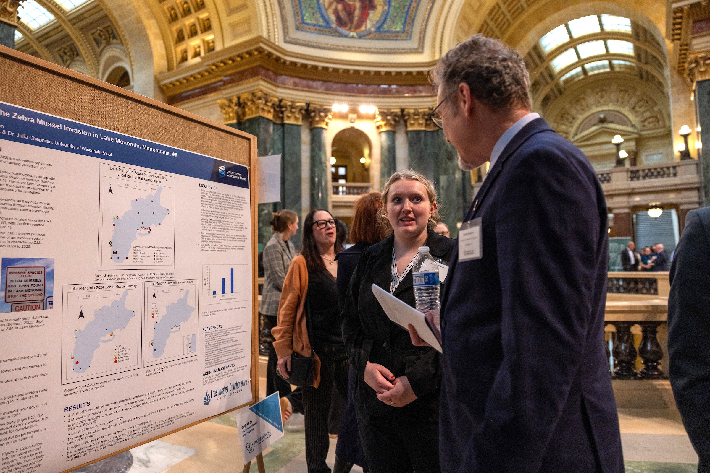 People speaking at research event