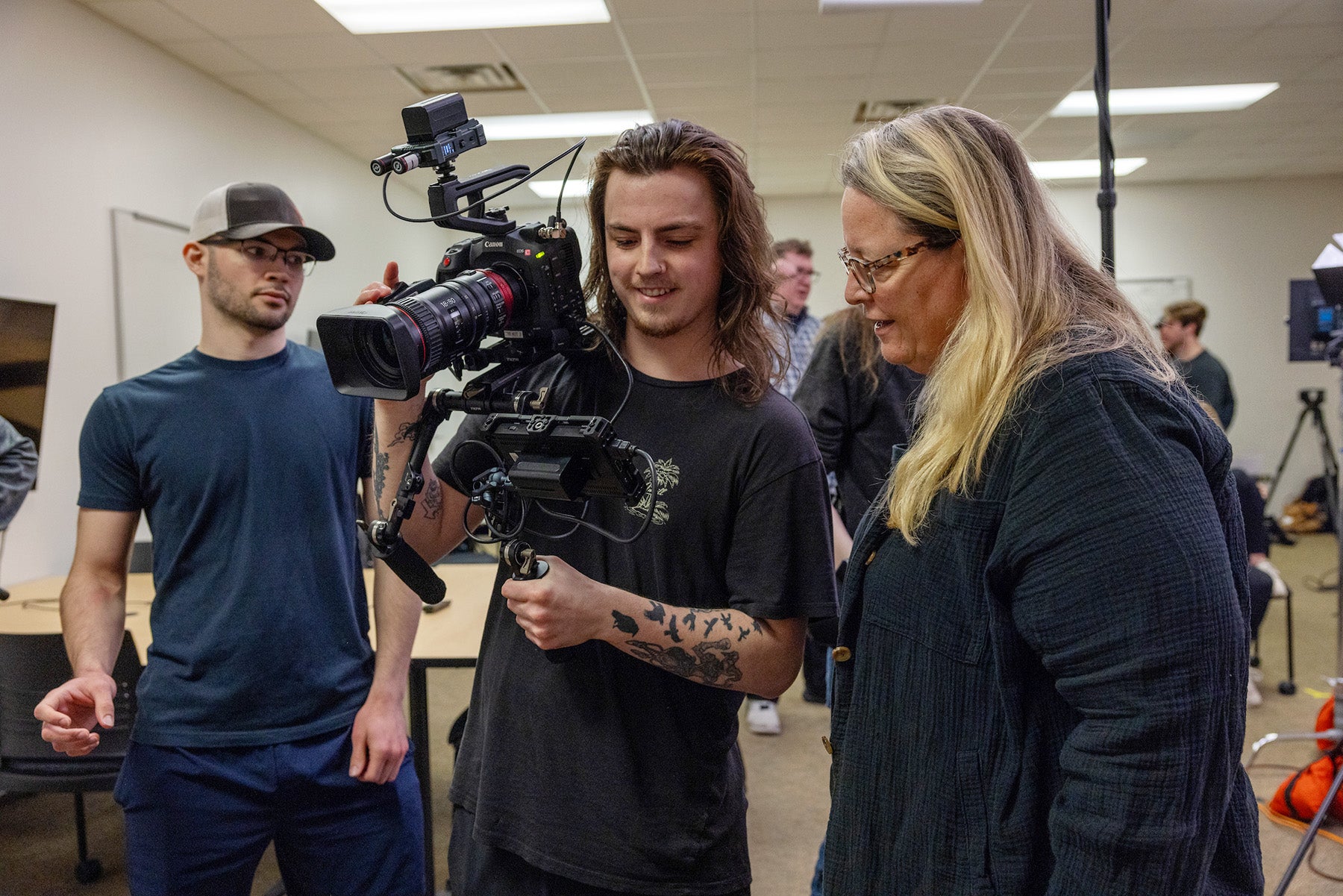 Man holds video camera