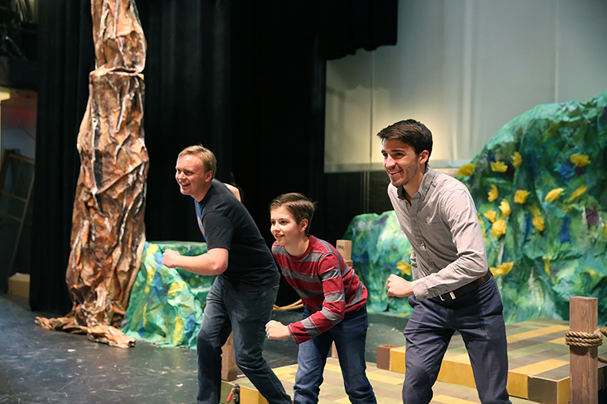Gus Johnson, at left, as Edward, talks with Gavin Hall, young Will, during a rehearsal of the University Theatre musical production of “Big Fish” opening April 6. UW-Stout photo by Brett T. Roseman
