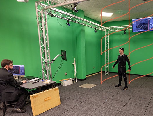 Student develop a character in the game design lab.