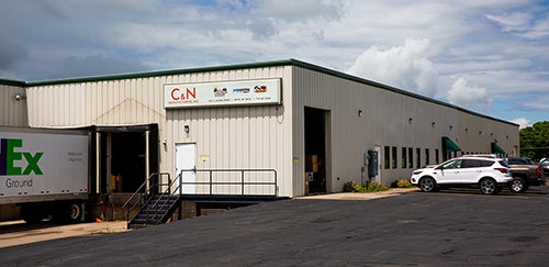 A FedEx semi sits at the loading dock recently at C&N Manufacturing in Boyd.