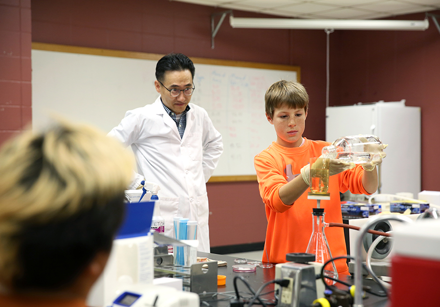 Carson Oemig, a Stanley-Boyd Middle School student, conducts a test during the festival, which is part of the Wisconsin Science Festival.