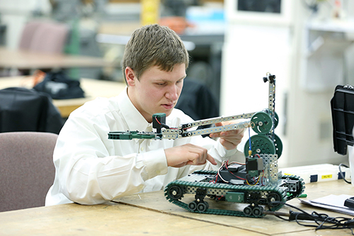 David Craig works on his search and rescue robot
