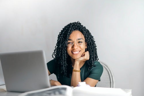 Women sitting in front of laptop 