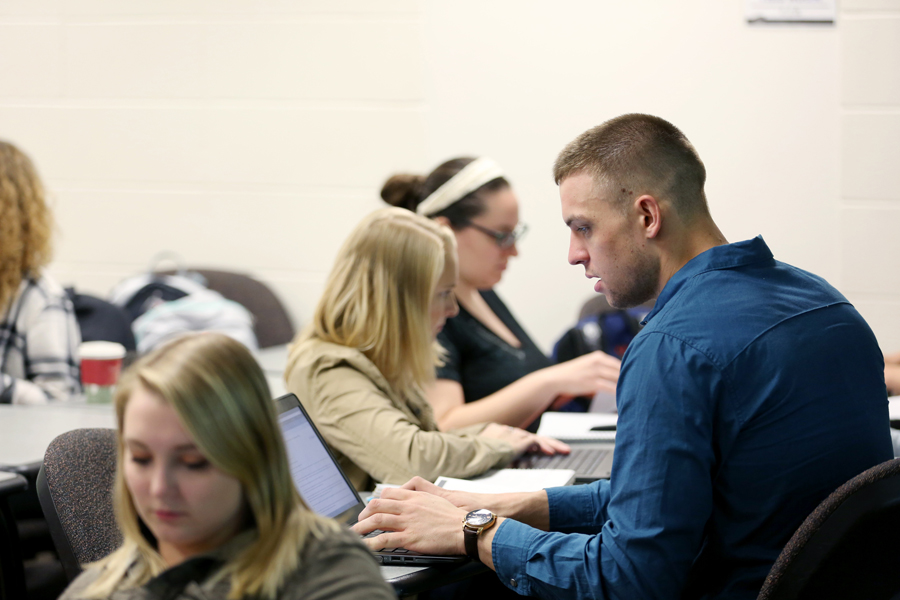 Human development and family studies majors work in the Family Policy class at UW-Stout.