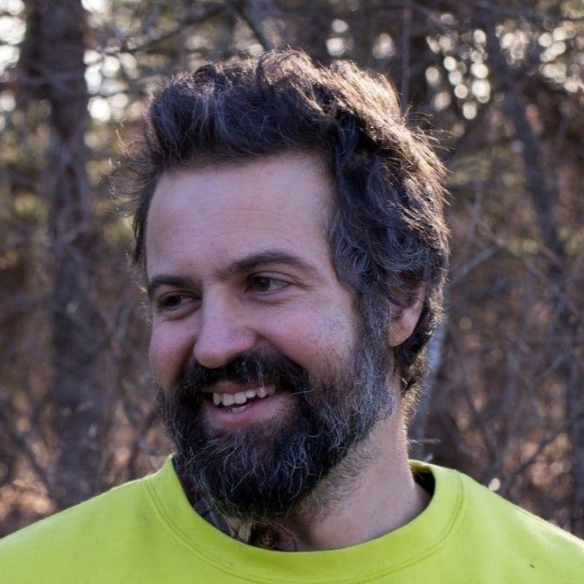 Young man with hair and full beard