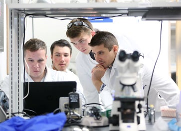 Photo of students working in chemistry lab