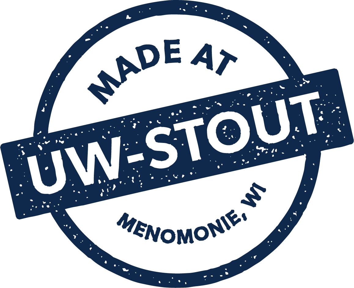 Made at Stout service mark consisting of a circle containing "Made At" and the blue horizontal band crossing the circle with "UW-Stout" at its center.