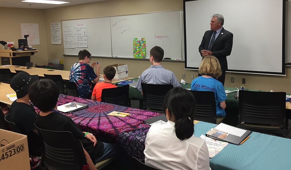 Chancellor Bob Meyer speaks with the students attending the intercultural leadership portion of the Summer STEAM Experience, urging them to pursue their dreams.