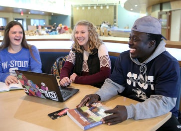 Photo of students talking at the Fireside Cafe