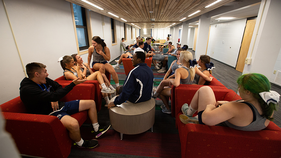 Students gather in a common area of UW-Stout’s North Hall. 