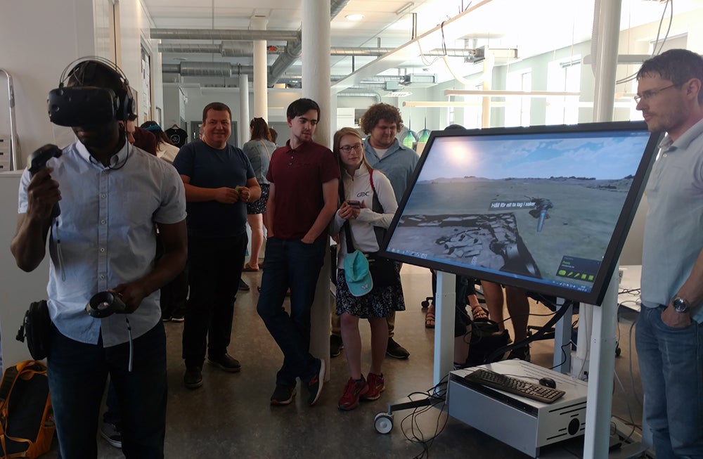 UW-Stout student Jonathan Williams tests a virtual reality program while on a trip to Sweden that included 22 other students. 