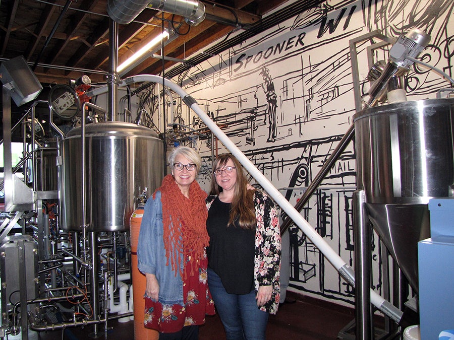 Michelle Martin, at right, pictured with Sue Churchill, first lady at the Round Man Brewing Co. in Spooner. Churchill says Martin is a great leader.