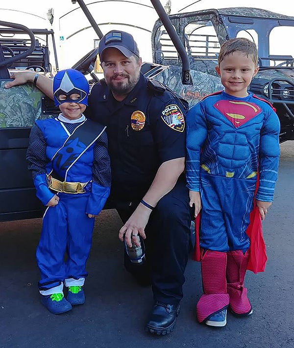 Joel Clapero, Hayward police chief, with his sons