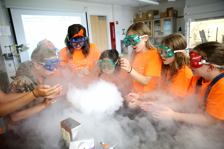 STEPS campers learn about cloud formation and weather patterns during a demonstration using liquid nitrogen.
