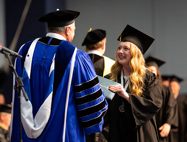 Students celebrate during commencement ceremonies Saturday, May 4.