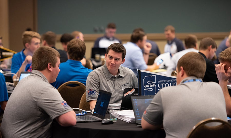 UW-Stout team members work on their entry at the ABC national competition in Long Beach, Calif.