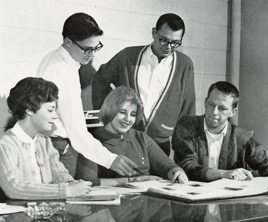 Becky Cranston, left, meets with members of the Tower yearbook staff in 1963.