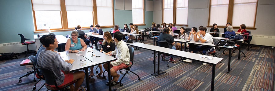 The conversations are held Fridays through Aug. 9. Students say the conversations allow them to meet community members and learn more about the American culture.