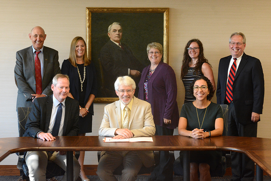 ​​​​​​​Patrick Guilfoile, center, meets with his Cabinet on his first day as interim chancellor at UW-Stout.