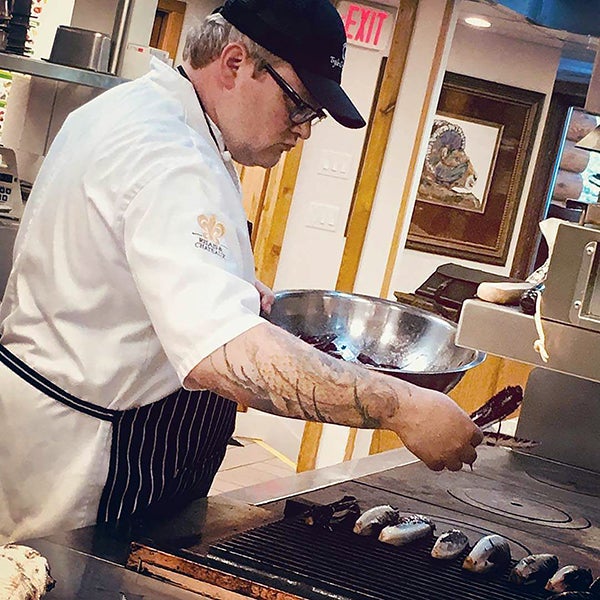 Brent Halverson works in the kitchen at Triple Creek Ranch.