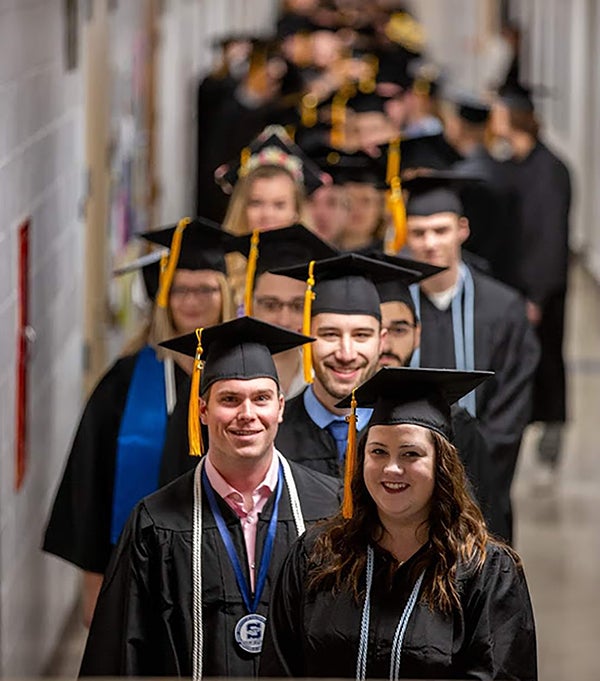 Jack Hemsath, second in line, graduates from UW-Stout in December 2019 with a degree in applied biochemistry and molecular biology.