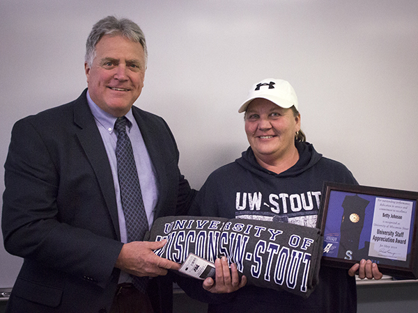 Betty Johnson receives the University Staff Employee Appreciation Award for May from UW-Stout Chancellor Bob Meyer.