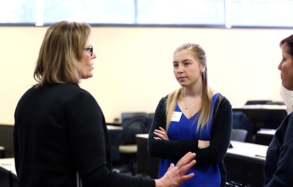 Elijah Zimmerman returned to college to get his bachelor’s degree in management with the goal to become a better provider for his growing family. Diane Conlon, a mother of three, decided to get her diploma in information and communication technologies because she wanted a career change and better work environment. Lauren Carlson was glad that she could return to school without leaving her job. “I didn’t have to put my career on hold to finish my degree,” said Carlson, a management graduate. They are just a few examples of nontraditional, adult students who recently have taken advantage of expanded Online Adult Degree Completion options at University of Wisconsin-Stout. The university has added ICT; psychology; and hotel, restaurant and tourism management as adult-geared degree completion programs, to go with the long-standing management program. UW-Stout offers similar programs to students on campus, but these online versions are specifically designed to more seamlessly provide credit for previous learning, such as university or technical college credits or advance placement credits from high school. Work experience is also often applied as credit for these types of programs. Professional development, training, certifications, military experience and more could qualify for college credits and bring students closer to their goal before ever starting additional coursework. Carlson, for example, used her work experience to satisfy the management program’s requirement for an internship. “I had a wonderful experience in the online program,” she said. “Everyone in this program wants to see you succeed, and they are here to help you get to that end goal of graduating.” In 2012 she accepted a full-time job prior to graduating from UW-Stout and never got around to finishing her degree — until she graduated in May 2020. Craig Brown of Milwaukee chose UW-Stout to finish his degree because it accepted more of his credits from Milwaukee Area Technical College than any other online program he checked into, he said. UW-Stout ha