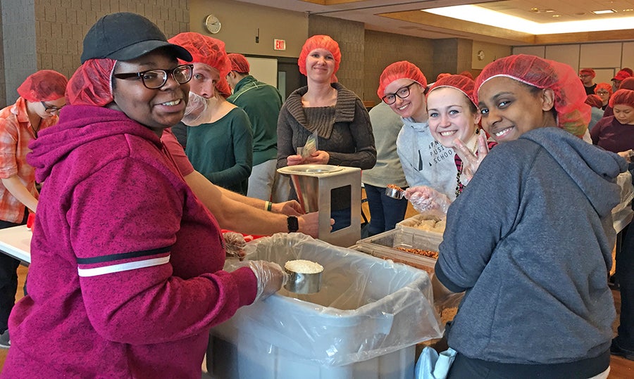 ​    ​Students say packing the meals was a great way to give back to the community right on campus.