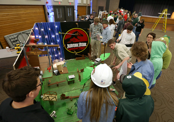  Plum City High School students set up their Jurassic Park machine at the Rube Goldberg regional competition at UW-Stout.