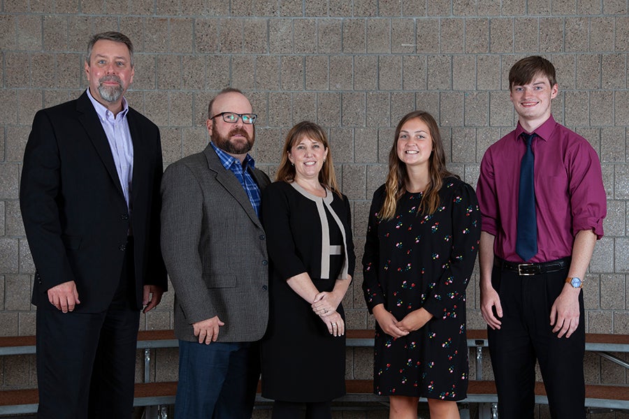 From left, donors Gary Schuster, Michael Luethmers and Amy Luethmers meet two of the recipients of the Freshman Legacy Annual Scholarship, Anna Kent and Zachary Peplinski.