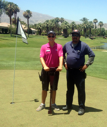 UW-Stout alumnus Cody Semingson, left, meets with foreman Rudy Alcaraz at the PGA West Nicklaus Tournament course, where Semingson is assistant course superintendent.
