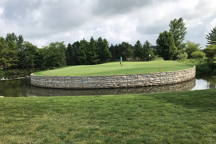 Water surrounds the green on the 14th hole at Somerby Golf Club, where UW-Stout alumni Adam Chandler and Nate Musta are two of the pros. Somerby is ranked as one of the top 20 courses in Minnesota.