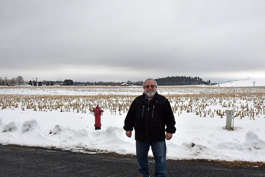 Chris Smith at shovel-ready site in Stout Technology and Business Park