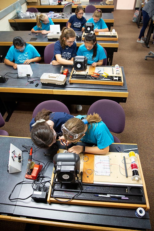 STEPS for Girls campers working in a lab.